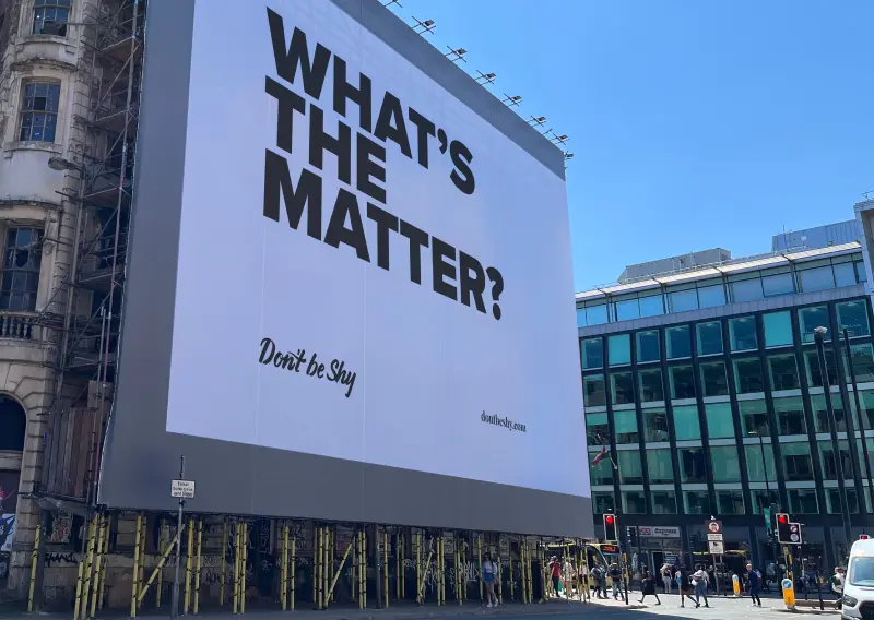 Large advertising space with the text 'What's he matter'